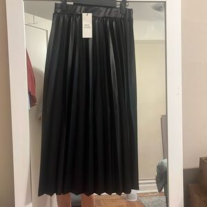 Black leather look midi skirt with slit